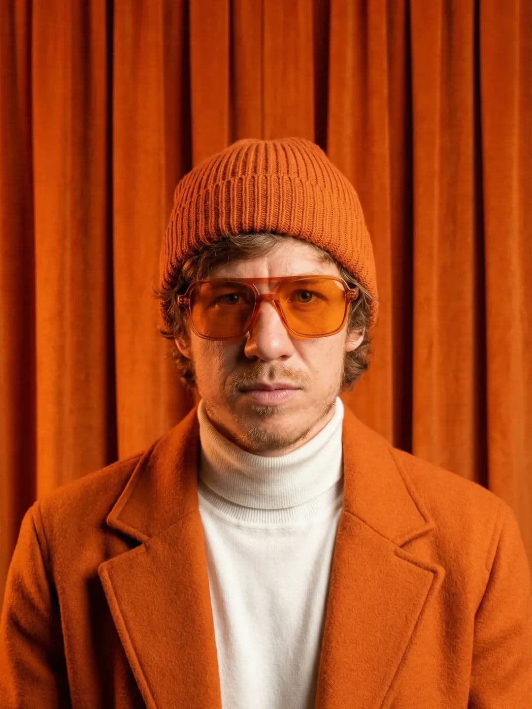 Monochromatic Orange Portrait Prompt – Fashion Editorial with Beanie and Sunglasses — Portrait AI art prompt example for Gemini and Stable Diffusion